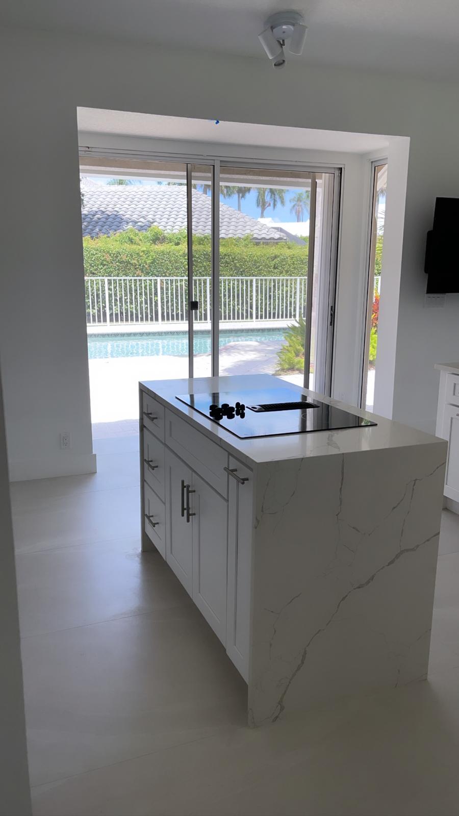 Kitchen island with pool view